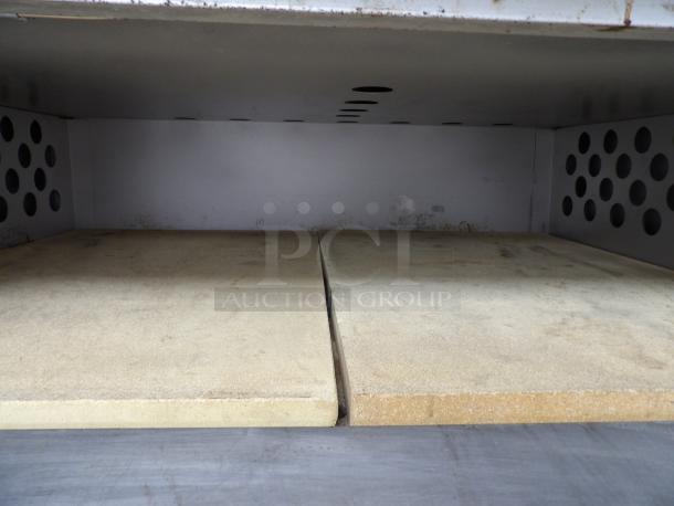 Bakers Pride D-125 Super Deck oven interior with 10" deck height, natural gas, in unused condition.