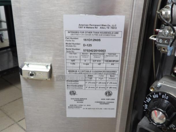 Bakers Pride D-125 oven label shows model info, ETL certification, 125,000 BTU, 300-650°F range, and gas type.