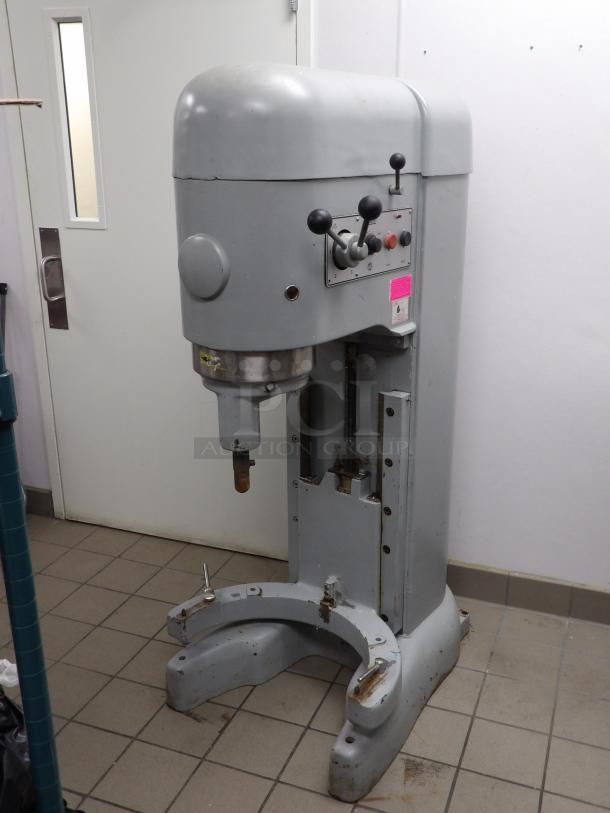 Hobart M802 metal commercial dough mixer, 80-quart capacity. Floor style, 208 volts, 3-phase. Powered on and working.