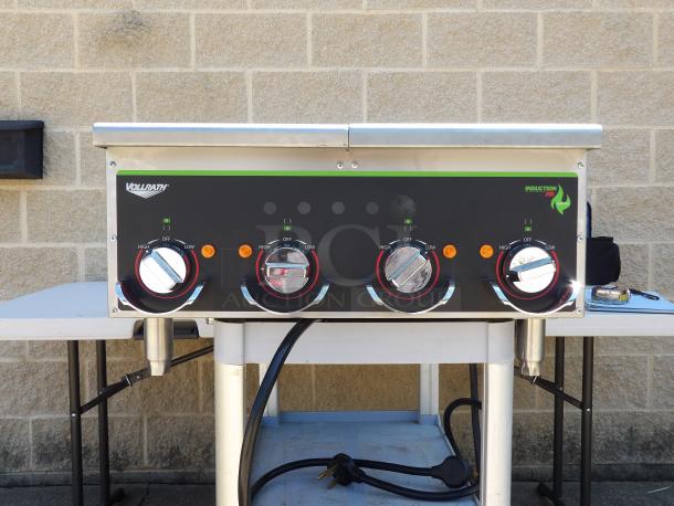 Vollrath 924HIMC stainless steel 4 burner induction range, electric, 208/240 volts, 1 phase, in good condition.