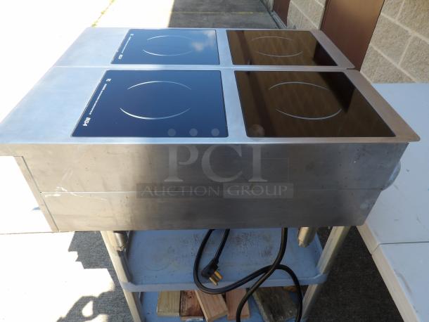 Vollrath 924 HIMC stainless steel induction range, 4-burner, electric, 208/240V, 1 phase, commercial grade, used condition.