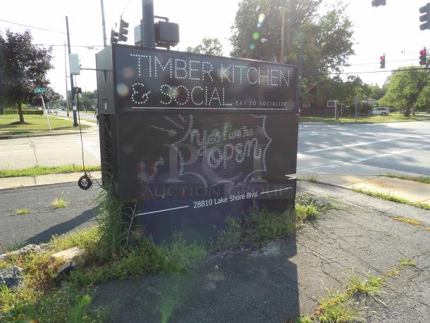 Vantage LED Flex-5 outdoor 16mm RGB street sign, 28-3/8" x 84", double-faced, programmable. Visible "Timber Kitchen & Social".
