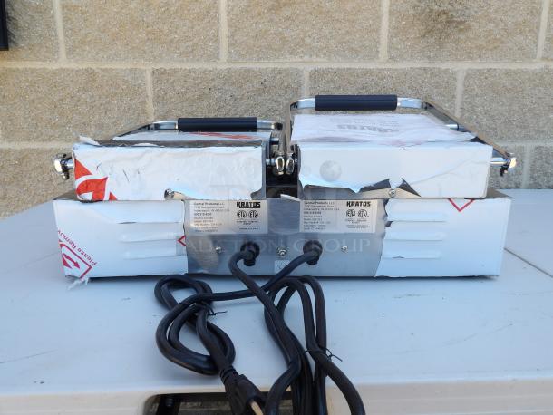 New Kratos 29Y-023 Commercial Double Panini Grill, grooved plates, scratch & dent, labels visible, cords attached.
