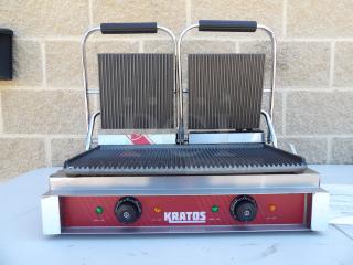 New Kratos 29Y-023 commercial double countertop panini grill, grooved plates, slight scratches, two control dials.