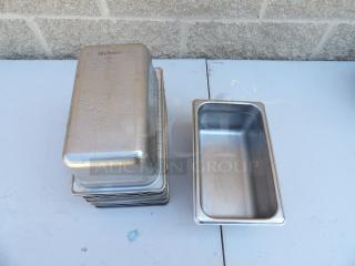 Huber stainless steel hotel pans, stack of 10, with visible branding and NSF label, used condition.
