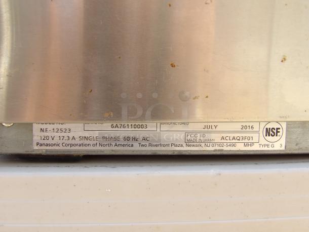 2016 Panasonic NE-12523 stainless steel commercial microwave, 120V, NSF certified, model label visible, good condition.