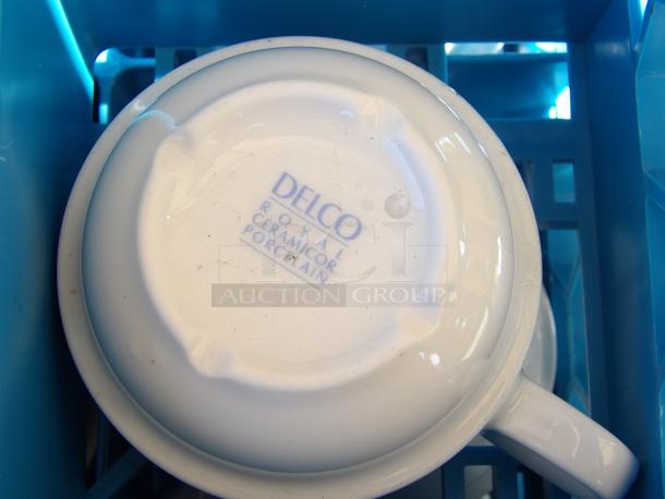 Delco Royal Cermaicor porcelain cup, 7.0 oz., marked base, white, in stack. Condition appears good, no visible chips.