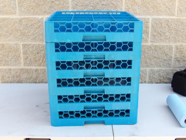 Carlisle RC 16 Hole Dishwasher Rack, blue hexagonal design, stacked view, used condition, perfect for commercial use.
