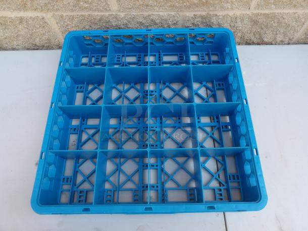 Carlisle RC 16 blue dishwasher rack with 16 compartments, durable plastic, excellent condition.