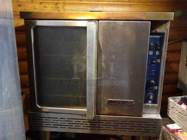 Imperial Stainless Steel Gas Convection Oven with view-through door, solid door, metal racks, and thermostatic controls.