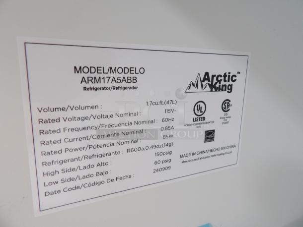 New Artic King 1.7 cu. ft. black single door refrigerator. Scratch & dent model. Model ARM17A5ABB label details specifications.
