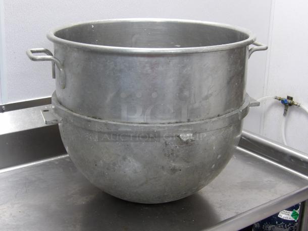 Stainless steel Hobart 80 quart mixing bowl with handles, in used condition. Ideal for commercial kitchen use.