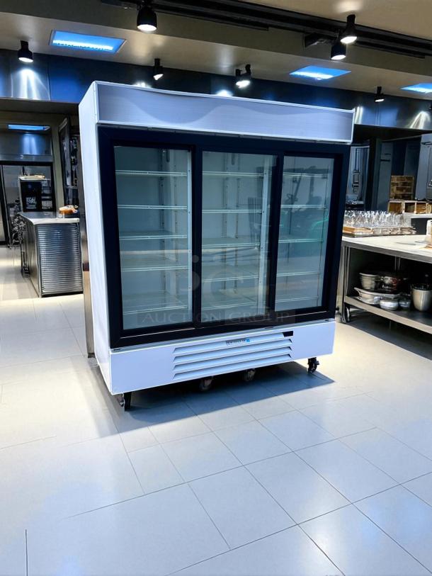 78" Beverage-Air MMR66HC-1-W triple glass door merchandiser refrigerator, excellent condition, fully tested, 115V.