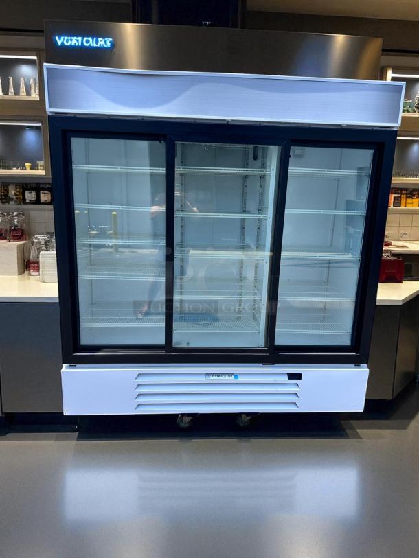 Beverage-Air MMR66HC-1-W triple glass door merchandiser refrigerator, 78", excellent condition, fully tested, 115V.