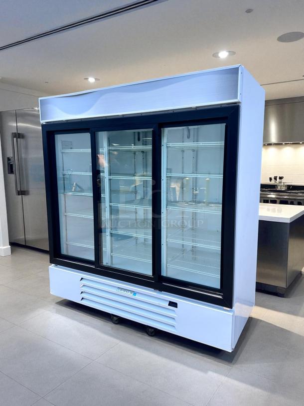 Beverage-Air MMR66HC-1-W, 78" triple glass door merchandiser refrigerator, excellent condition, fully tested, 115V.