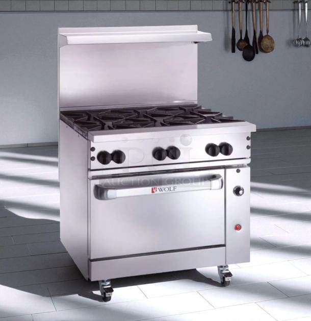 Wolf 36" Gas Range, Model 36C-Y1R, with 6 burners, oven, natural gas. Excellent condition, fully tested.