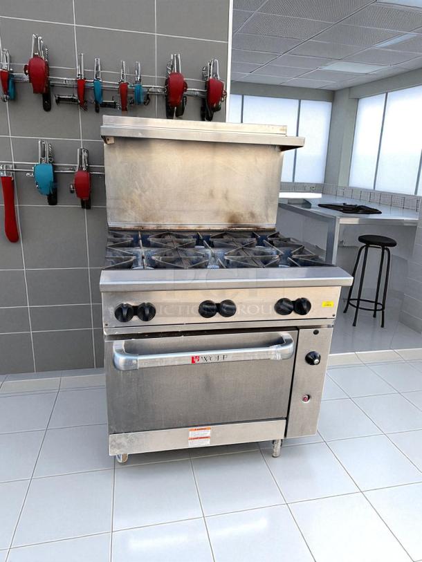 Wolf 36C-Y1R 36" gas range, six open burners, standard oven, natural gas, excellent condition, tested, working.