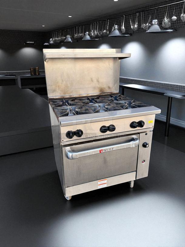 Wolf 36C-Y1R 36" gas range with 6 open burners and standard oven. Excellent condition, natural gas, fully tested.