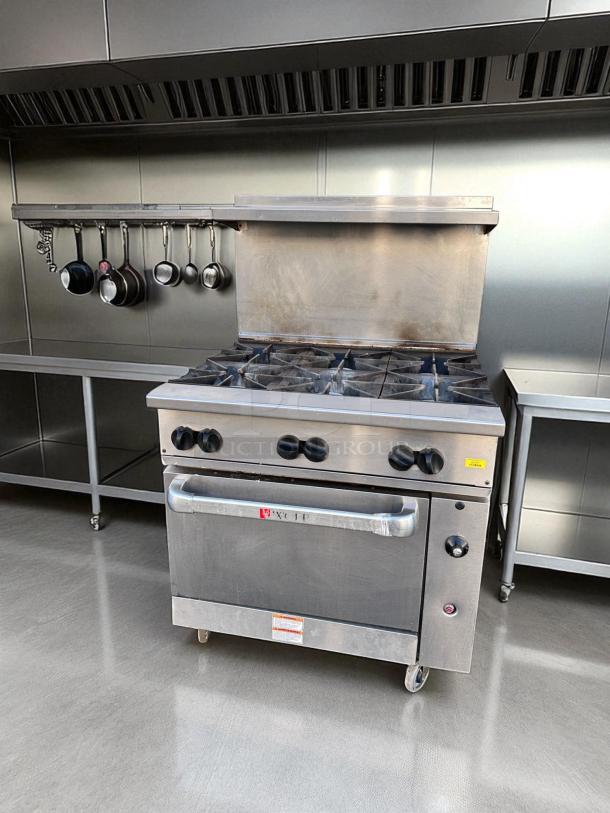 Wolf 36C-Y1R 36" gas range with 6 burners and oven, excellent condition, natural gas, fully tested and working.