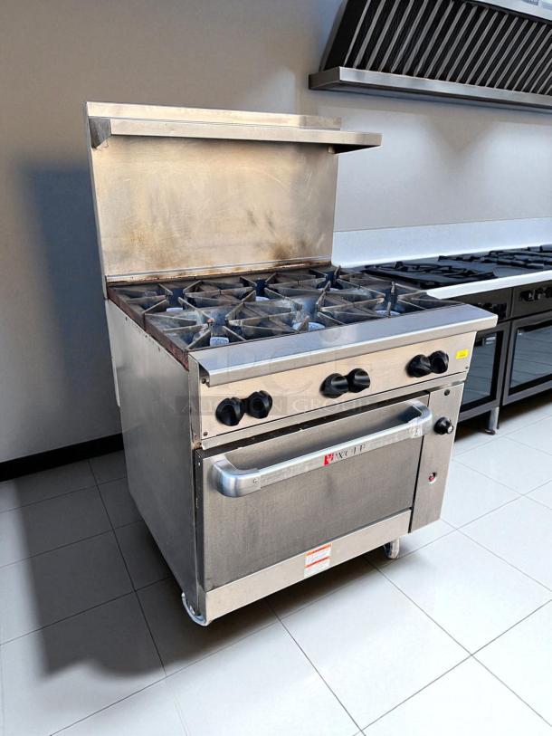 Wolf 36C-Y1R 36" gas range in excellent condition, featuring 6 open burners and a standard oven. Natural gas; fully tested.