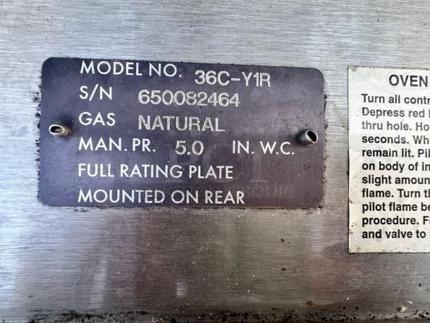 Label showing Wolf 36C-Y1R Gas Range specs: natural gas, model number, serial number, pressure, rear mounting.