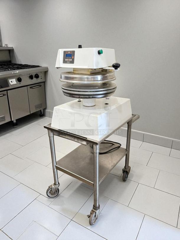 Proluxe DP2350 manual heated pizza dough press, 18" plate, 208V, excellent condition, fully tested, on rolling stand.