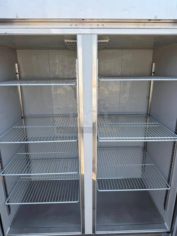 Delfield GBR2P-S 2-door reach-in refrigerator, top-tier condition, fully tested, 115V, featuring adjustable wire shelves.
