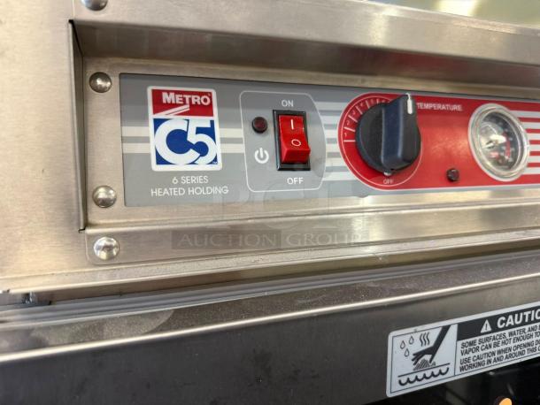 Metro C5 Heated Holding Cabinet, Model C563L-SFC-UA, in first-rate condition. Features control panel and NSF certification label.