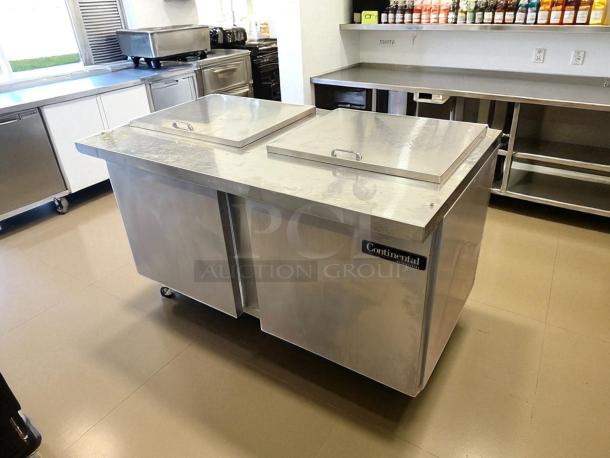 Continental SW60-24M commercial refrigerator freezer, dual lid top access, 115V, outstanding condition, fully tested.