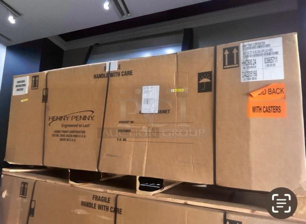 Brand new Henny Penny HHC900.24 2-door electric holding cabinet in original box, heavy-duty stainless, unused, 120V.