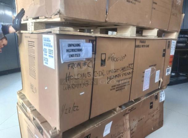 Brand new Henny Penny HHC900.24 2-door electric holding cabinet, heavy-duty stainless, unopened box with unpacking instructions.