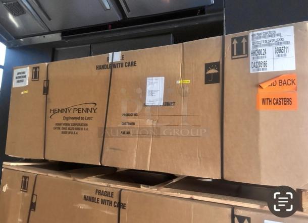 Brand new Henny Penny HHC900.24 in box, 2-door electric holding cabinet, 120V, heavy-duty stainless, unused with casters.