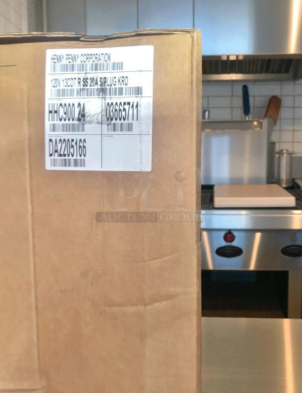 Brand new Henny Penny HHC900.24 electric holding cabinet in box. Features heavy-duty stainless steel, 120V. Unused.