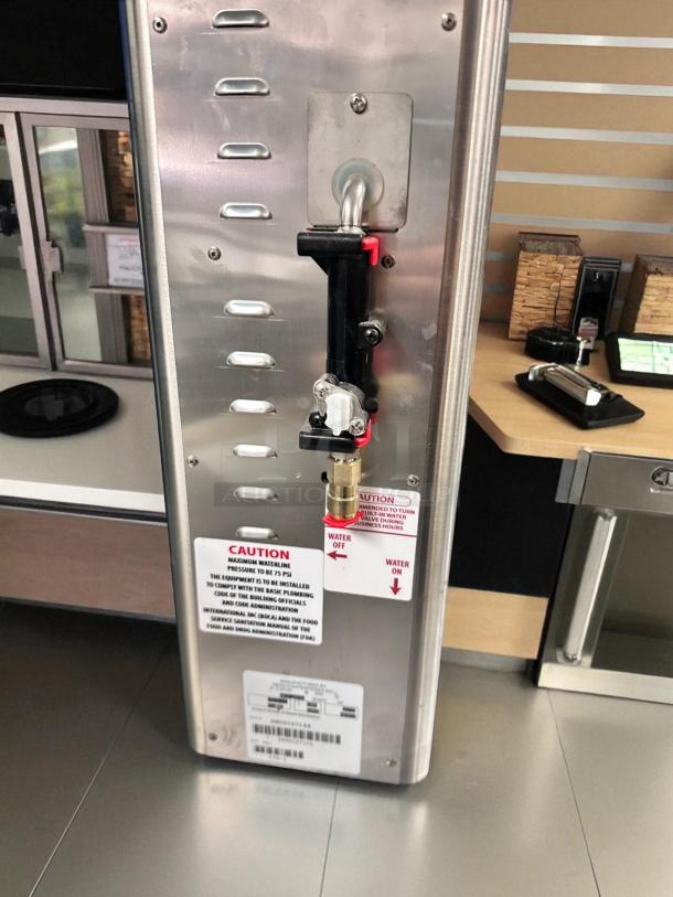 Newco FPM-1 lemonade dispenser in excellent condition with Tomlinson spout. Features caution labels and is fully tested.