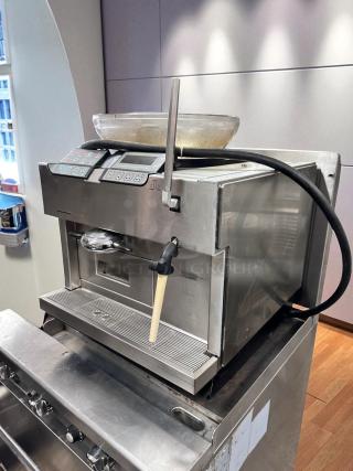 Carimali Eco Super-Automatic espresso machine in outstanding condition with dual group heads, steam wand, fully tested, and working.