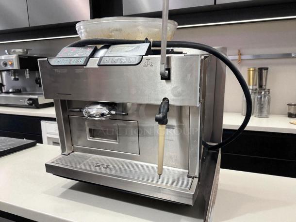 Carimali Eco Super-Automatic espresso machine with dual group heads, steam wand, fully tested, in outstanding condition.