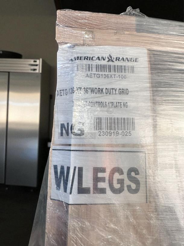 American Range AETG-136XT 36" gas griddle, new, natural gas, with legs, wrapped packaging, model AETG136XT-100 label.