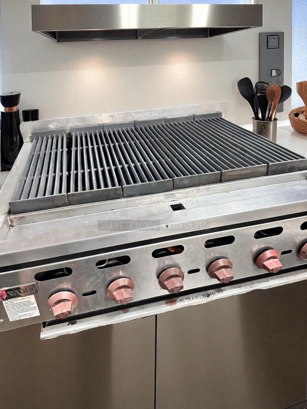 Wolf commercial gas charbroiler, 6 burners, natural gas, great condition, fully tested, Wolf Range Co. branding visible.