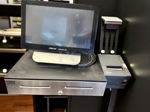 Oracle Micros RES 3700 POS system with touchscreen terminal, cash drawer, power dock; fully tested, top-tier condition.