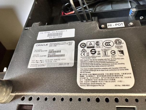 Oracle Micros RES 3700 POS system, excellent condition, with docking station labels showing part and serial numbers, FCC compliance.