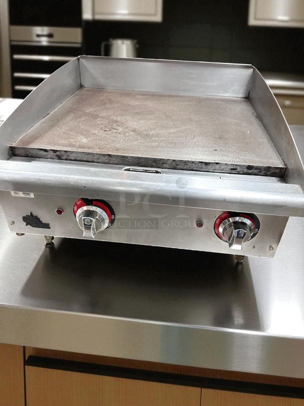 Commercial 24" gas griddle in outstanding condition on countertop. Manual controls, fully tested and working.