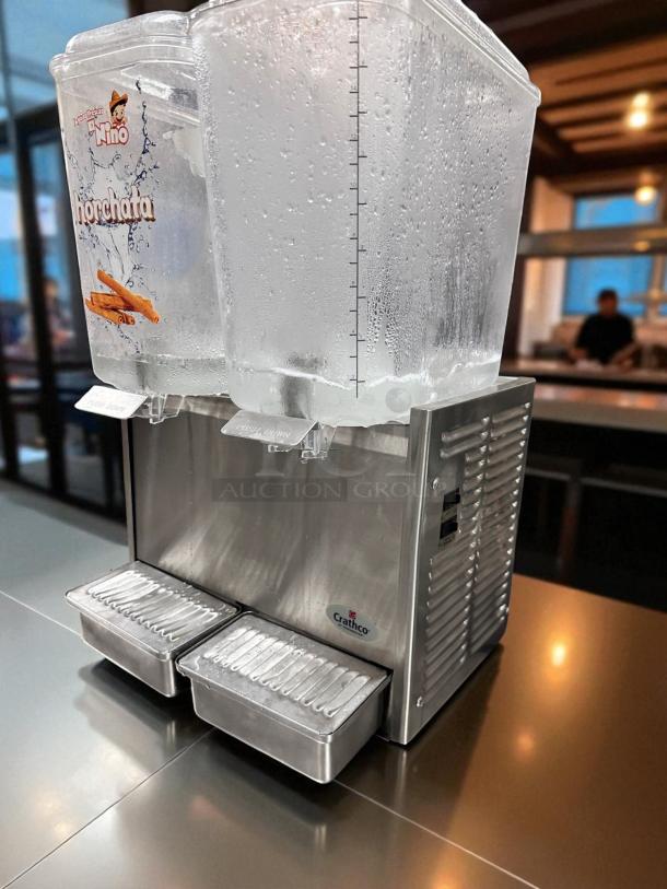 Crathco D25-3 beverage dispenser, 5-gallon x2, stainless steel, outstanding condition, fully tested, labels indicate "Horchata."
