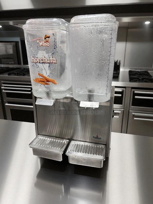 Crathco D25-3, 5-gallon dual cold beverage dispenser, stainless steel, excellent condition, "Horchata" label, 115V, tested.