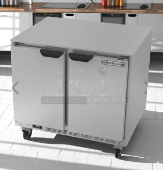 Superb condition Turbo Air TST-48SD 48" salad prep table with dual doors, 115V, fully tested, with black handles and digital display.
