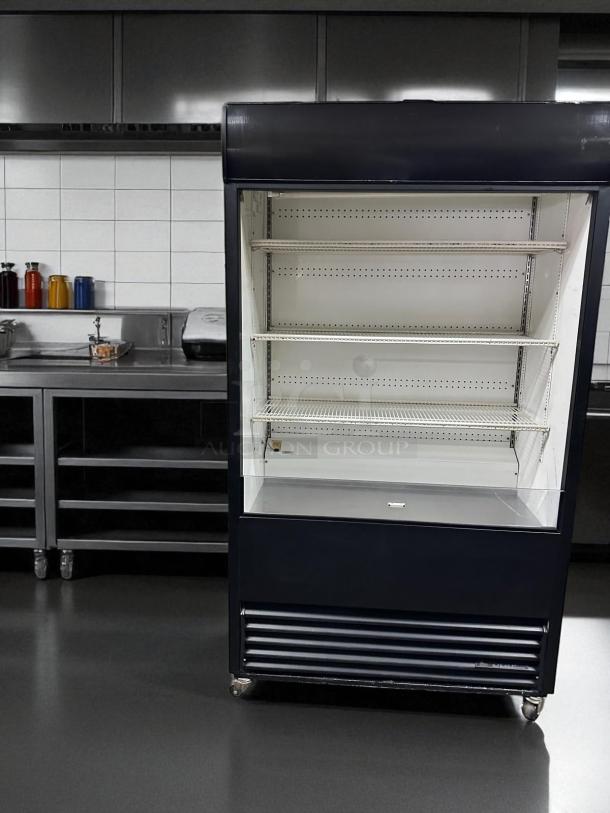 True TAC-48 air curtain open display merchandiser, 48", in outstanding condition, 208/230V, fully tested and working.