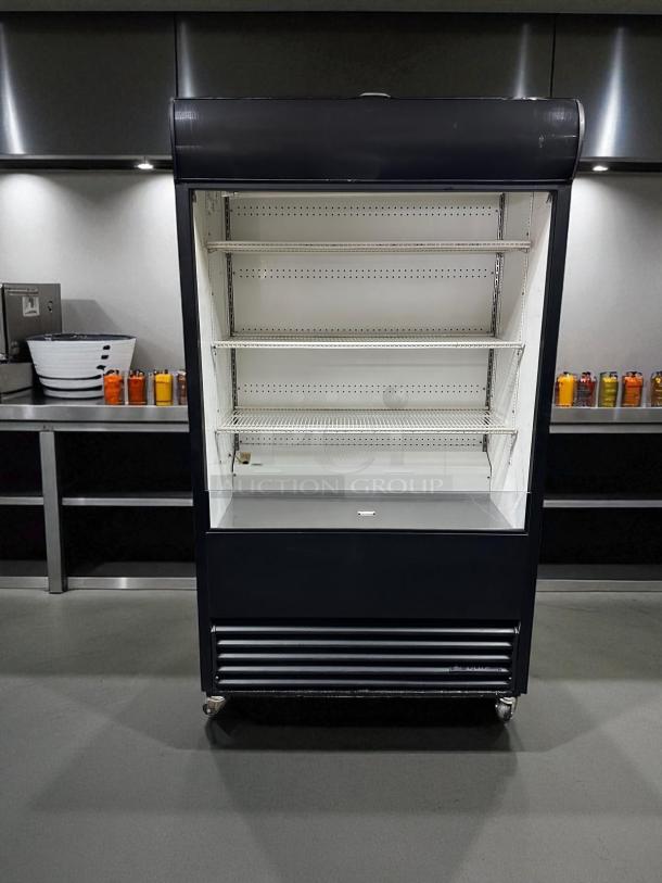 True TAC-48 open display merchandiser, 48", excellent condition, 208/230V, fully tested, black frame, three shelves.