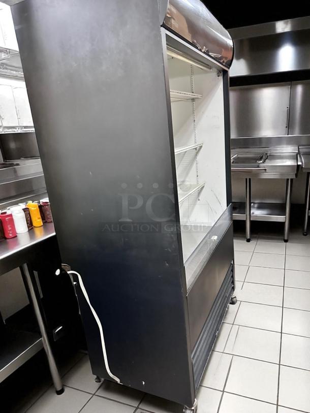 True TAC-48, 48" air curtain open display merchandiser in outstanding condition. Black exterior, fully tested, 208/230V.