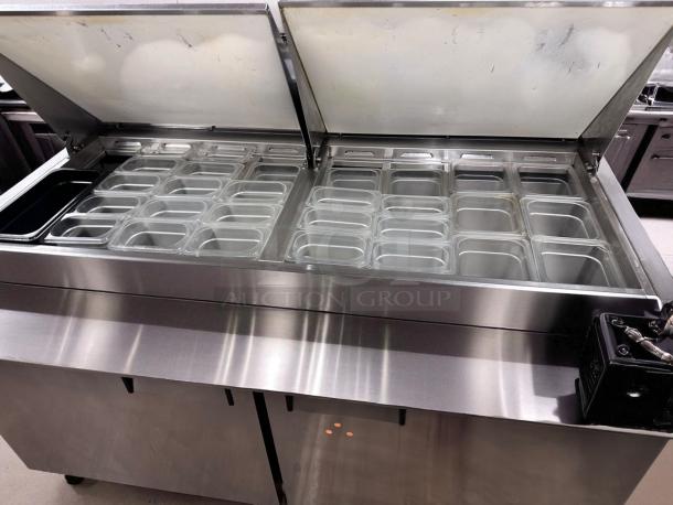Everest EPBWR2 refrigerated prep table, 2-door, top-tier condition, 115V, stainless steel, multiple ingredient bins.