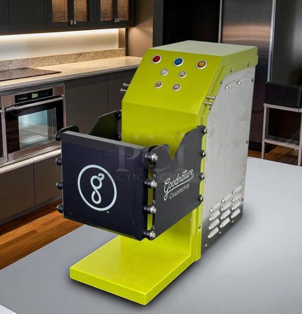 Goodnature CT7 cold press juicer in superb condition, 115V. Features lime green and black design. Fully tested and working.
