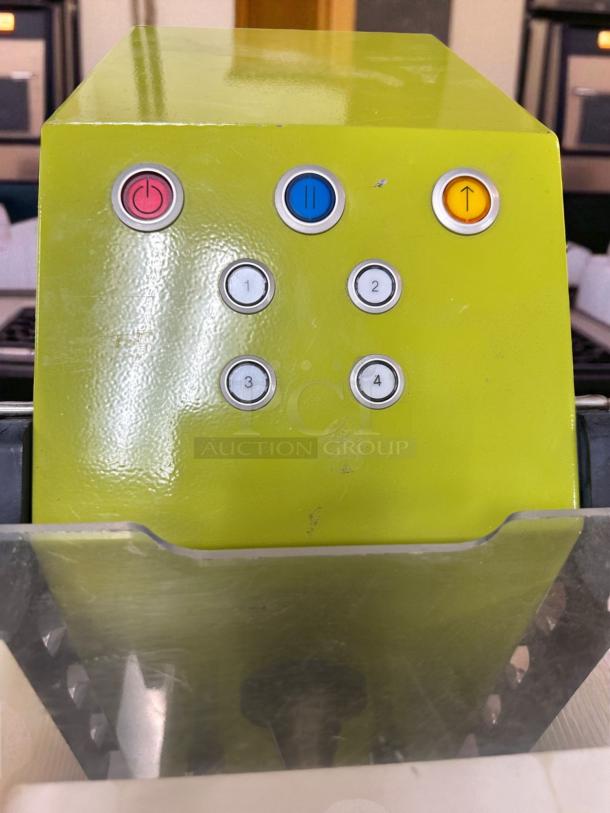 Goodnature CT7 cold press juicer, lime green, control panel buttons visible, superb condition, 115V, fully tested.